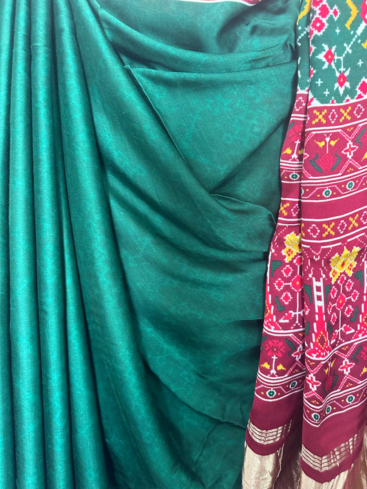 Green modal silk patola print sari with zari border pms- 1029
