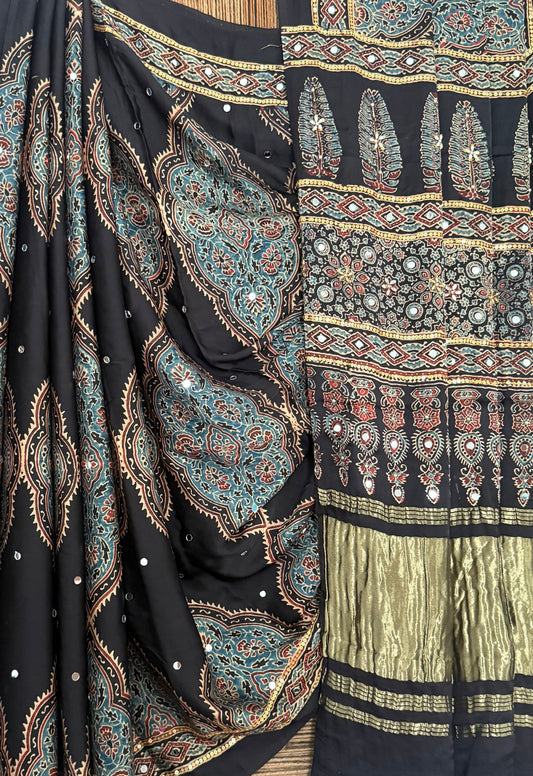 CARBON BLACK AJRAKH HANDCRAFTED MIRROR AND SEQUENCE WORK MODAL SILK SARI WITH ZARI PALLU