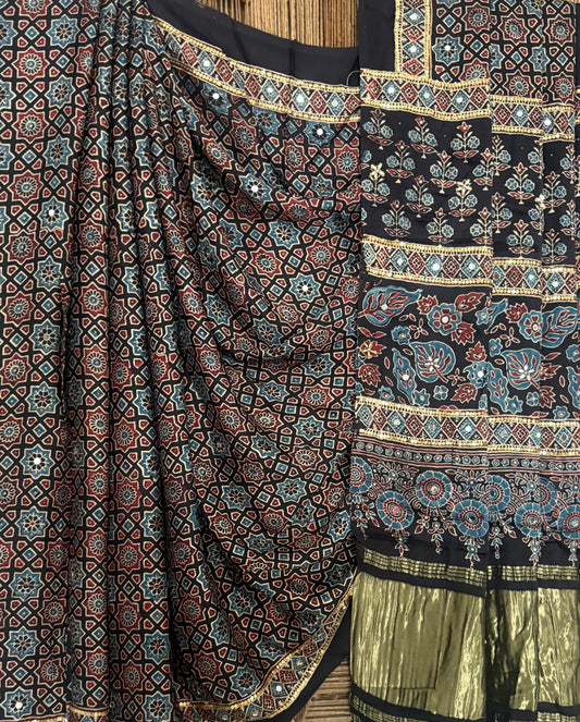 RAVEN BLACK AJRAKH HANDCRAFTED MIRROR AND SEQUENCE WORK MODAL SILK SARI WITH ZARI PALLU