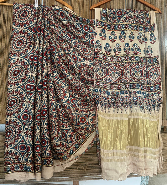 LINEN BEIGE AJRAKH HANDCRAFTED MIRROR AND SEQUENCE WORK MODAL SILK SARI WITH ZARI PALLU