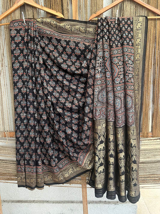 BLACK DOLA SILK AJRAKH ZARI BORDER SARI