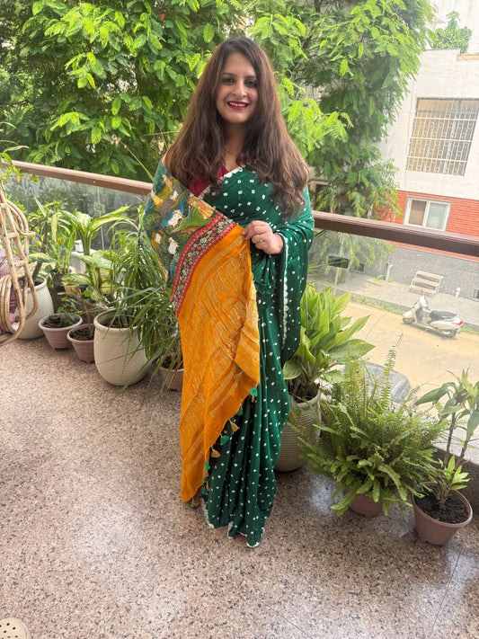 Bottle green modal silk bandhani sari with pichwai print