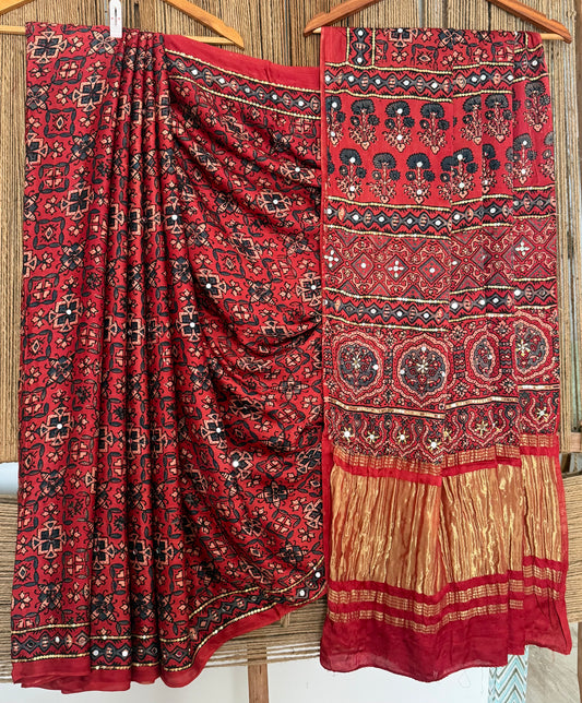 CRIMSON MAROON AJRAKH HANDCRAFTED MIRROR WORK MODAL SILK SARI WITH ZARI PALLU