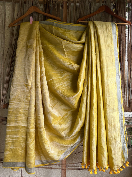 Golden yellow metallic linen sari with woven border & tassels