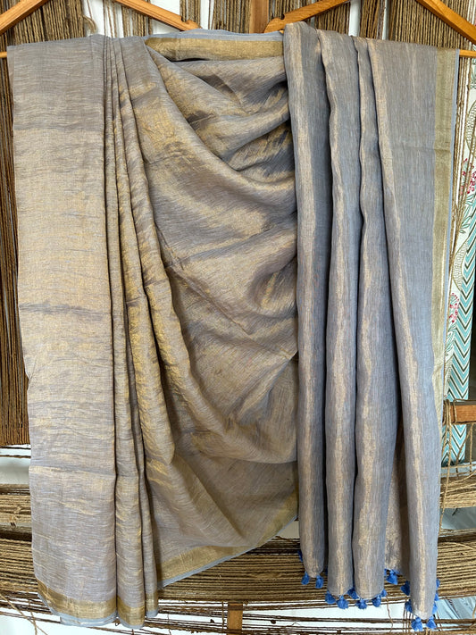 Powder Blue Metallic linen Sari with Silver woven Border and Tassels
