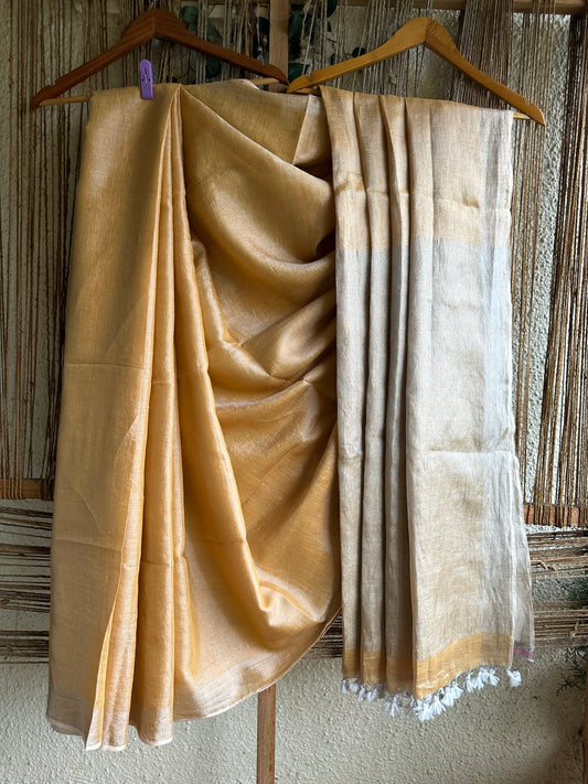 GOLDEN LINEN ZARI SARI WITH WOVEN WHITE BORDER & TASSELS