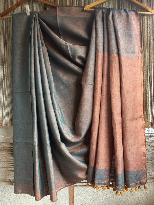 BLUE TISSUE LINEN TISSUE SARI WITH ZARI WOVEN BORDER & WHITE TASSELS AND PALLA (Copy)