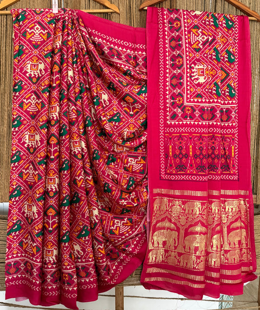 Pink modal silk patola print sari with zari border pms-