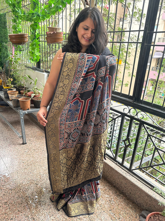 BLACK DOLA  SILK AJRAKH ZARI BORDER SARI