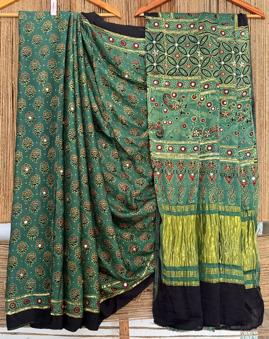 DEEP ORGANIC GREEN AJRAKH HANDCRAFTED MIRROR AND SEQUENCE WORK MODAL SILK SARI WITH ZARI PALLU