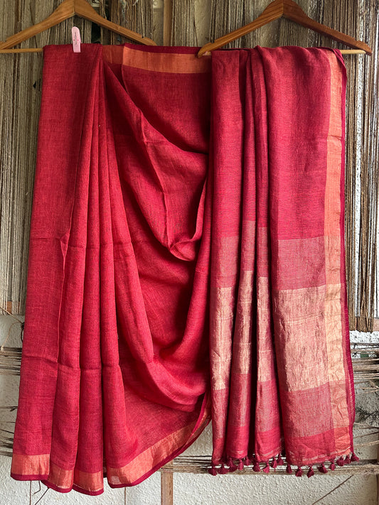 CHERRY RED LINEN COTTON SARI WITH WOVEN WHITE BORDER & ORANGE  TASSELS