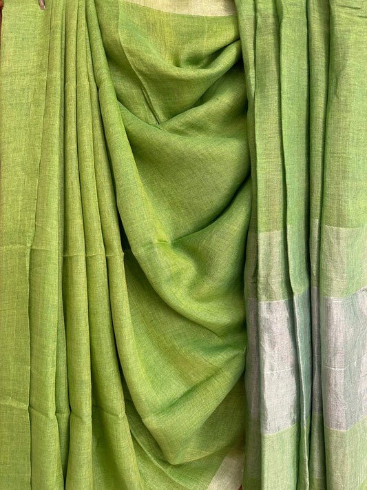PARROT GREEN LINEN COTTON SARI WITH WOVEN BORDER & PURPLE  TASELS AND PALLA