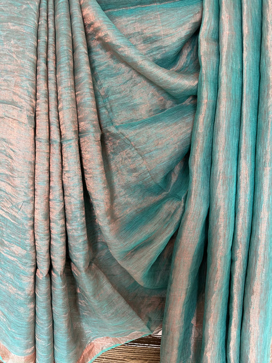 Turquoise Green Metallic linen Sari with Silver woven  Border and Tassels