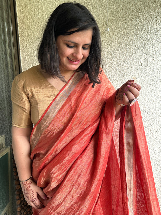 ORANGE METALLIC  LINEN SARI WITH WOVEN  BORDER &amp;  TASSELS