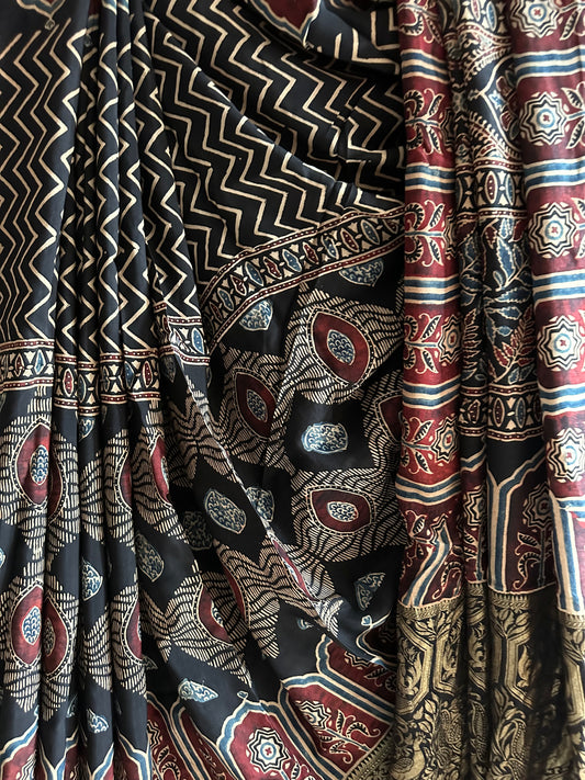 BLACK DOLA  SILK AJRAKH ZARI BORDER SARI