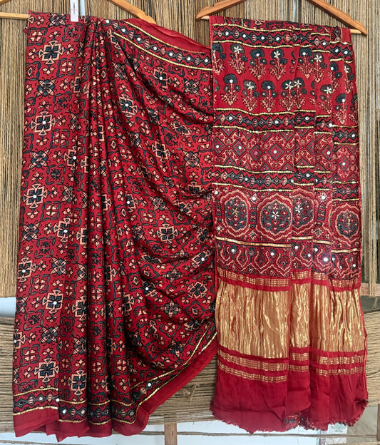 VINTAGE MAROON AJRAKH HANDCRAFTED MIRROR AND SEQUENCE WORK MODAL SILK SARI WITH ZARI PALLU