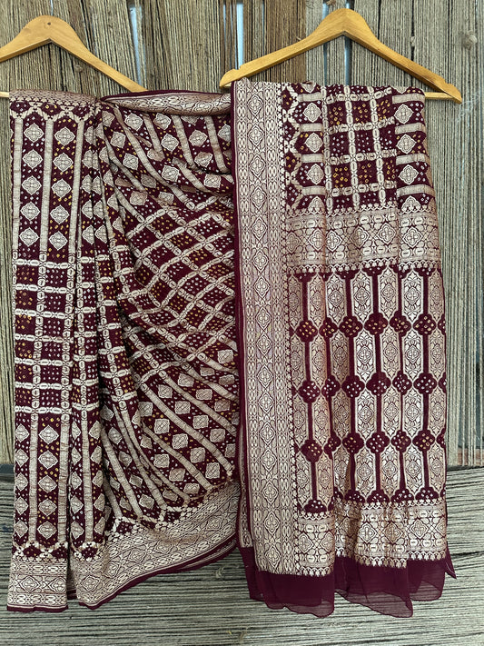 Burnt Maroon Handwoven Neem Zari Bareek Bandhani Saree with Khaddi Georgette with Meenakari Work  BS- 22