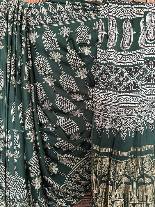 BOTTLE GREEN AJRAKH PRINT  MODAL SILK SARI WITH ZARI BORDER