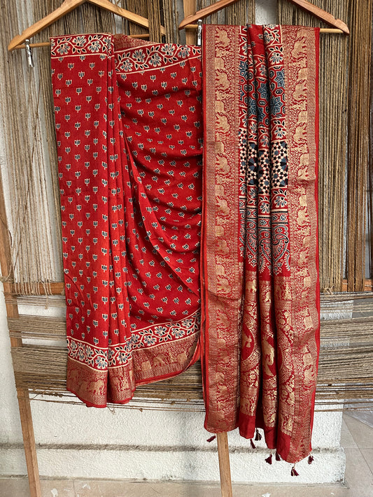 RED DOLA  SILK AJRAKH ZARI BORDER SARI