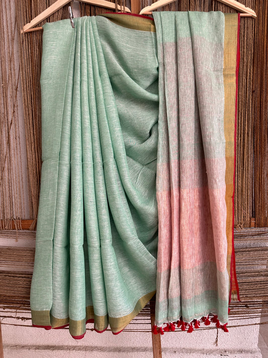 LIGHT GREEN  LINEN SARI WITH WOVEN  BORDER