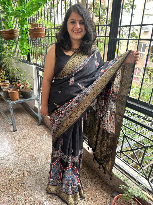 BLACK DOLA  SILK AJRAKH ZARI BORDER SARI