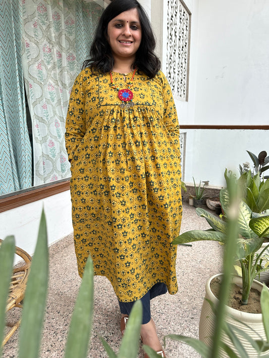 MUSTARD COTTON AJRAKH HANDCRAFTED KURTA WITH YOKE PIPING