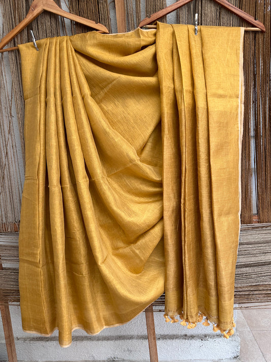 MUSTARD YELLOW TISSUE LINEN ZARI SARI WITH WOVEN YELLOW BORDER TASSELS