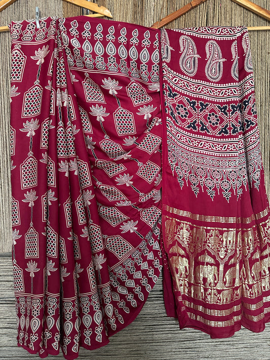 MAROON AJRAKH PRINT  MODAL SILK SARI WITH ZARI BORDER