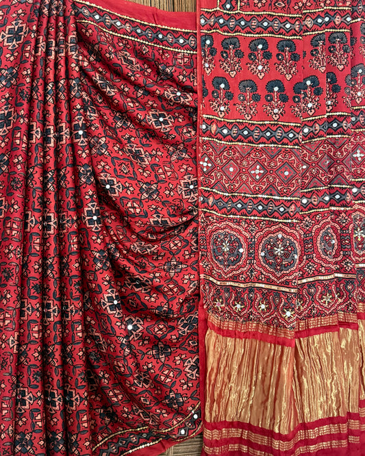 CRIMSON MAROON AJRAKH HANDCRAFTED MIRROR WORK MODAL SILK SARI WITH ZARI PALLU