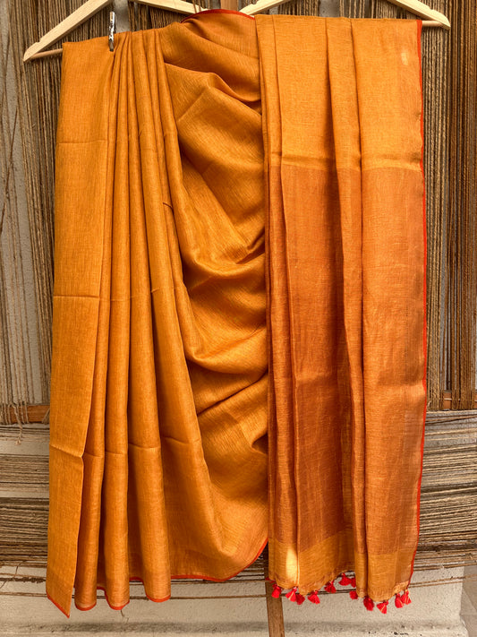 PEACH GOLDEN TISSUE LINEN ZARI SARI WITH WOVEN RED  BORDER