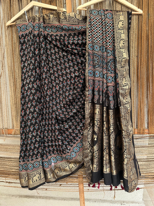 BLACK DOLA  SILK AJRAKH ZARI BORDER SARI