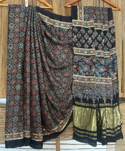 RAVEN BLACK AJRAKH HANDCRAFTED MIRROR AND SEQUENCE WORK MODAL SILK SARI WITH ZARI PALLU