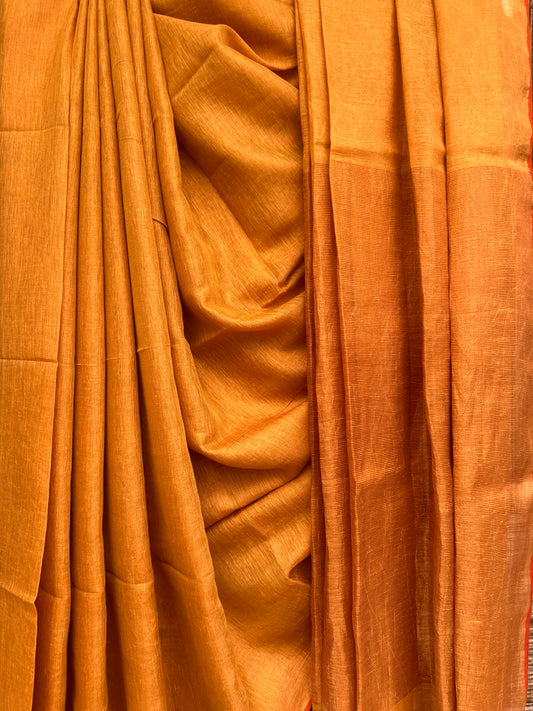 PEACH GOLDEN TISSUE LINEN ZARI SARI WITH WOVEN RED  BORDER