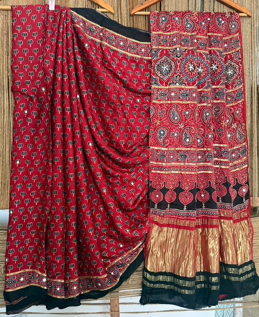 AESTHETIC MAROON AJRAKH HANDCRAFTED MIRROR AND SEQUENCE WORK MODAL SILK SARI WITH ZARI PALLU