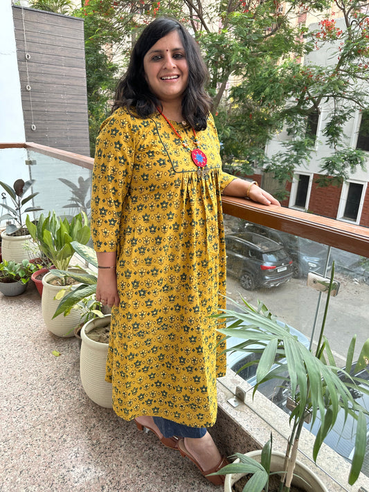 MUSTARD COTTON AJRAKH HANDCRAFTED KURTA WITH YOKE PIPING