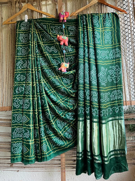 BOTTLE GREEN MODAL SILK PATOLA SARI WITH ZARI BORDER  PMS-10109