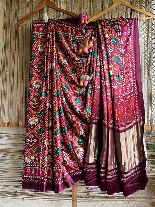 MAROON MODAL SILK PATOLA SARI WITH ZARI BORDER PMS- 1092